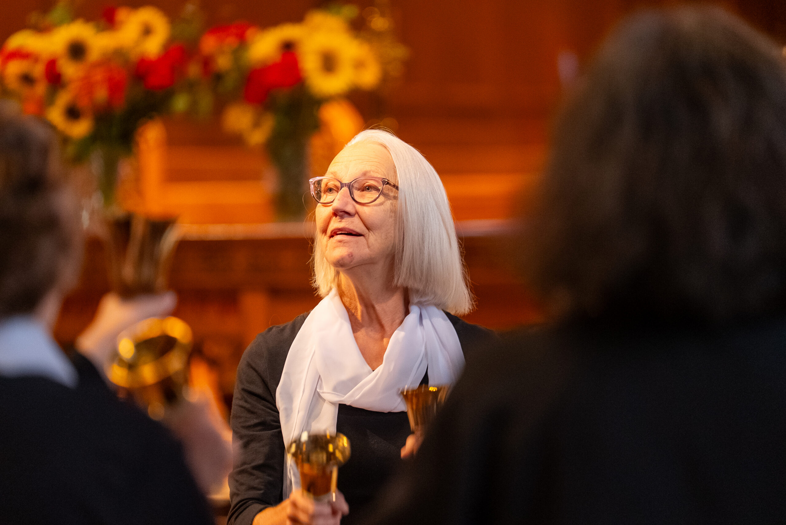 A Bells of Hope musician performing with a handbell