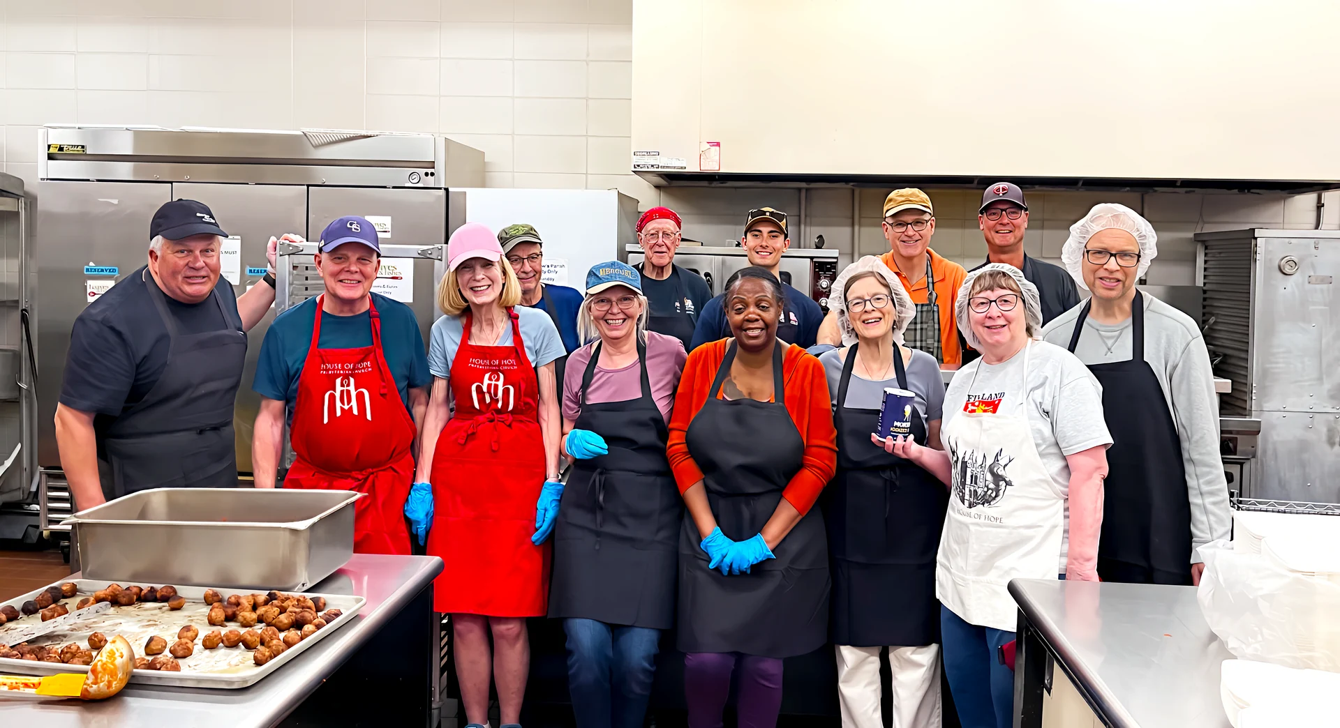 House of Hope Loaves & Fishes volunteers gathered in the kitchen.